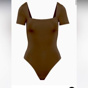 aritzia contour short sleeve body suit in the color Deep Currant Red